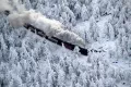Поезд, идущий через заснеженный лес в Германии. Автор: Наталья Савина, г.Нижний Новгород
